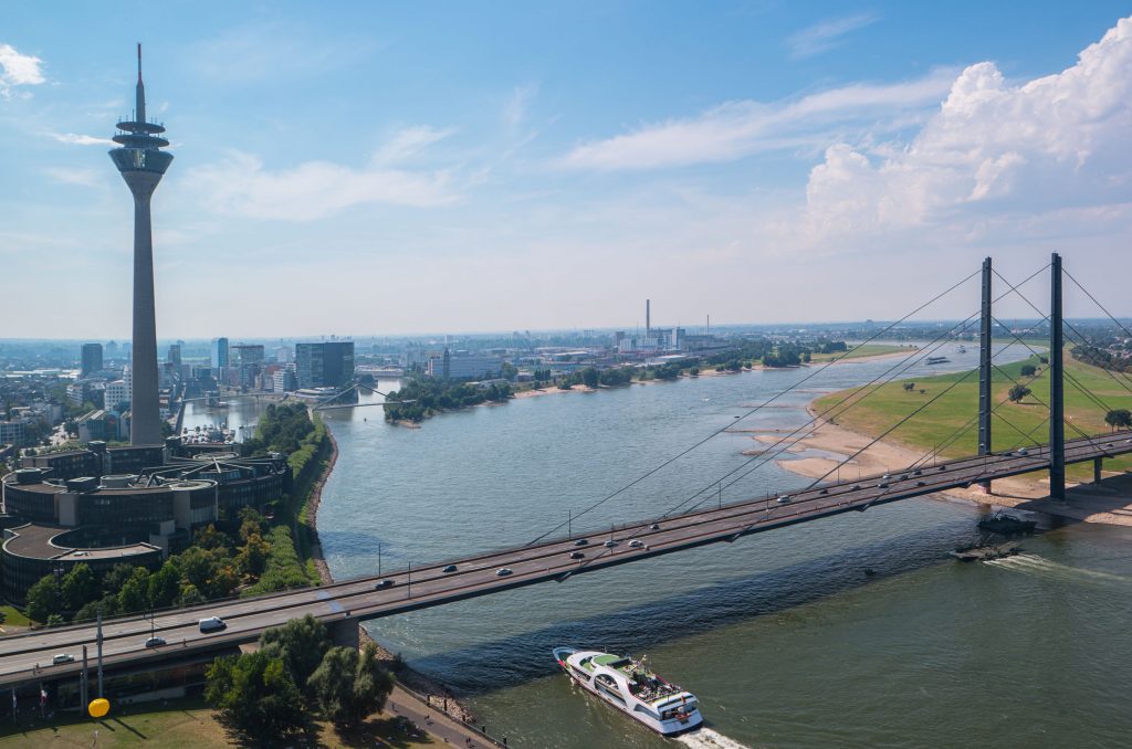 67036548 - cityscape of dusseldorf over the rhine river at summer