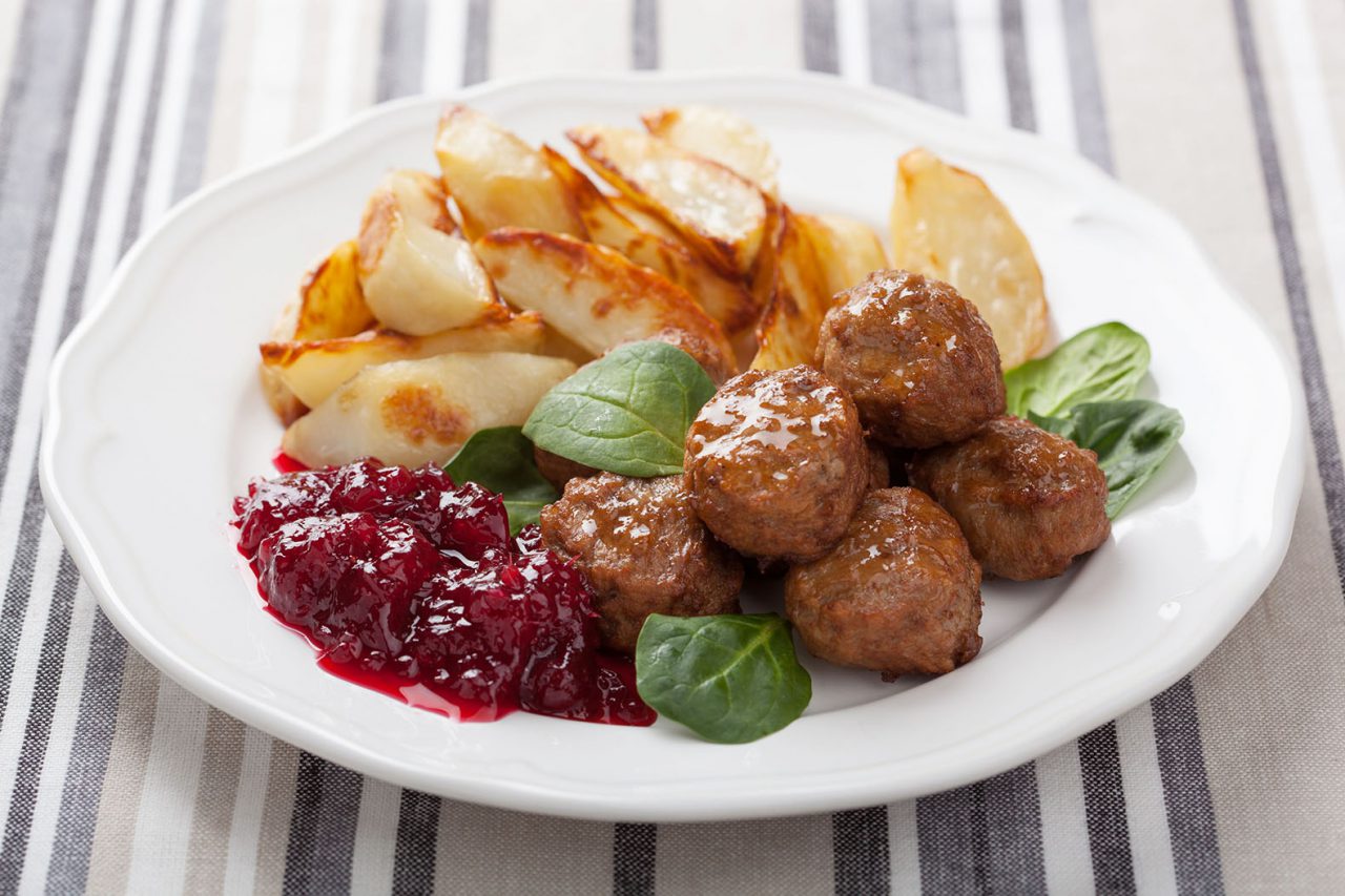 18990653 - swedish meatballs with potatoes and lingon jam