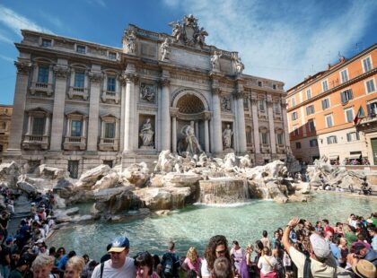 Trevi fountain in Rome, Italy, crowded with tourists