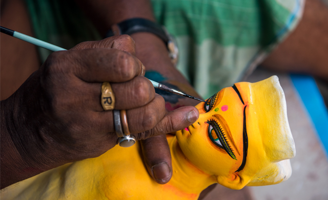 Painting the eyes of the idols is only performed by senior artisans
