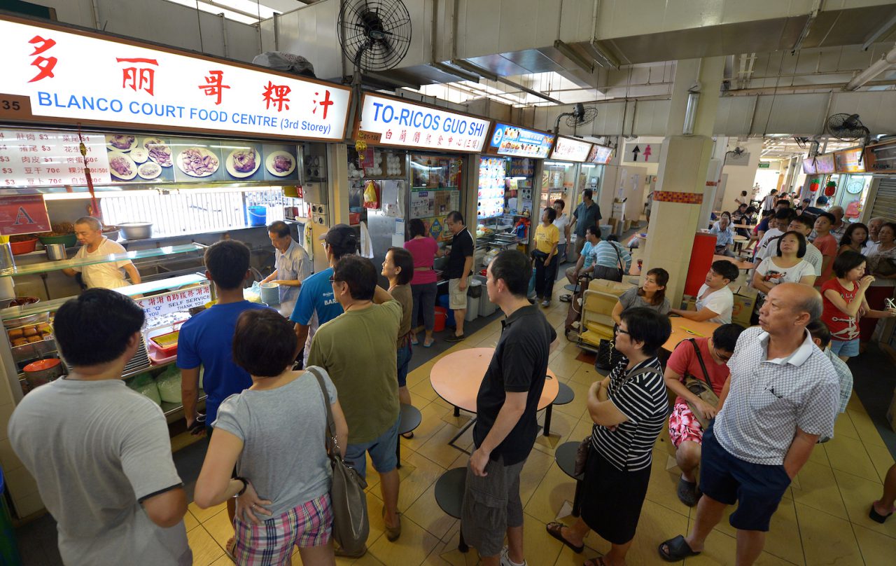 Queuing up for food in a Singapore hawker centre