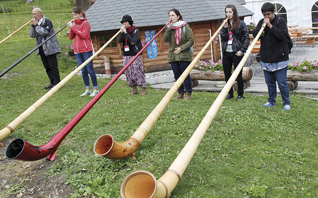 Playing the alphorn