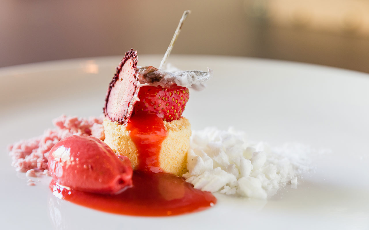 A dessert of strawberries and goat's cheese at Noel
