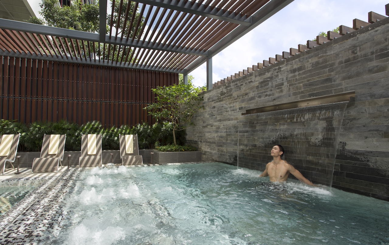 Relax in the jacuzzi pool at One Farrer Hotel Spa Retreat