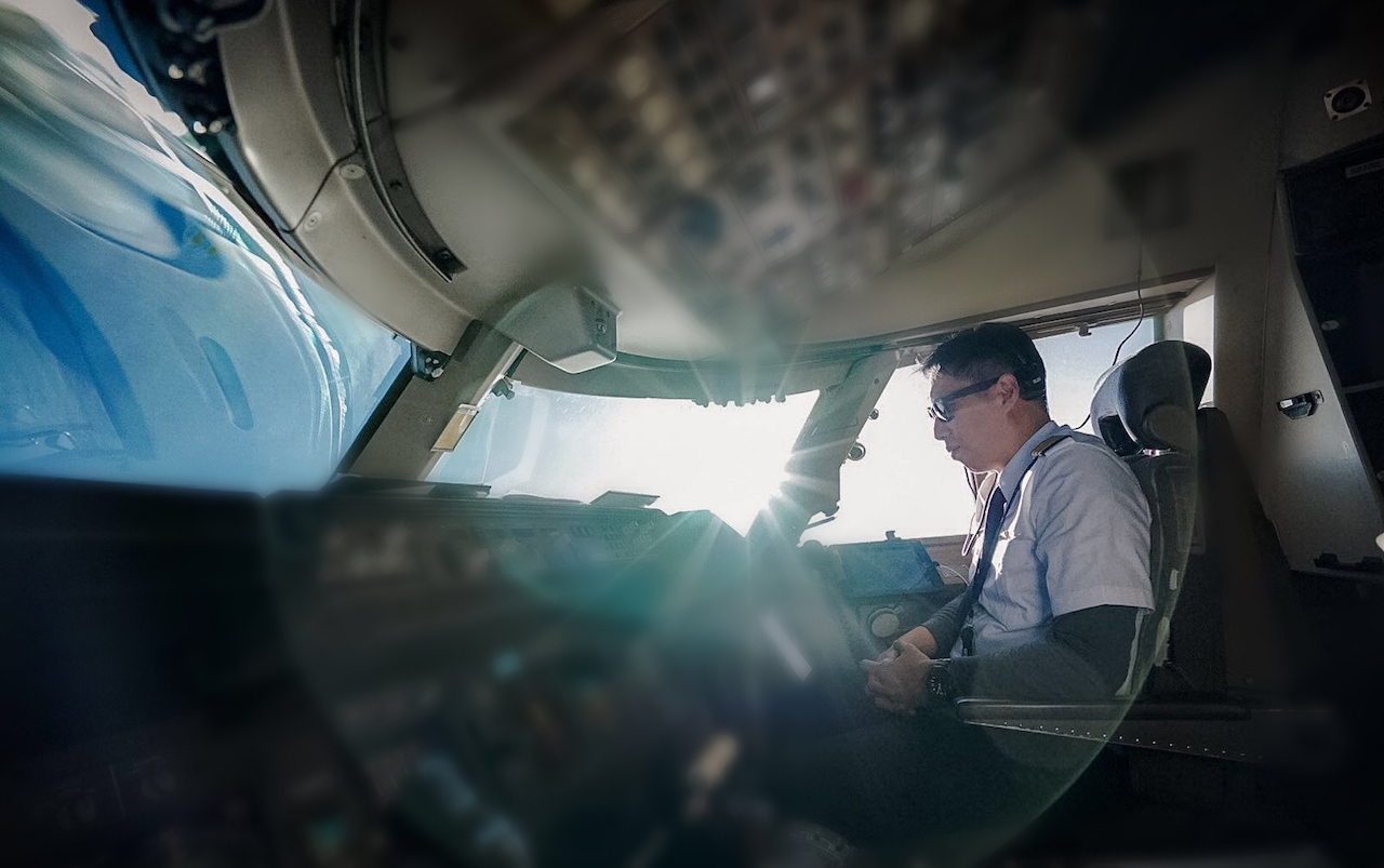 Toh Lim at the helm of a Boeing 747-400 cargo flight