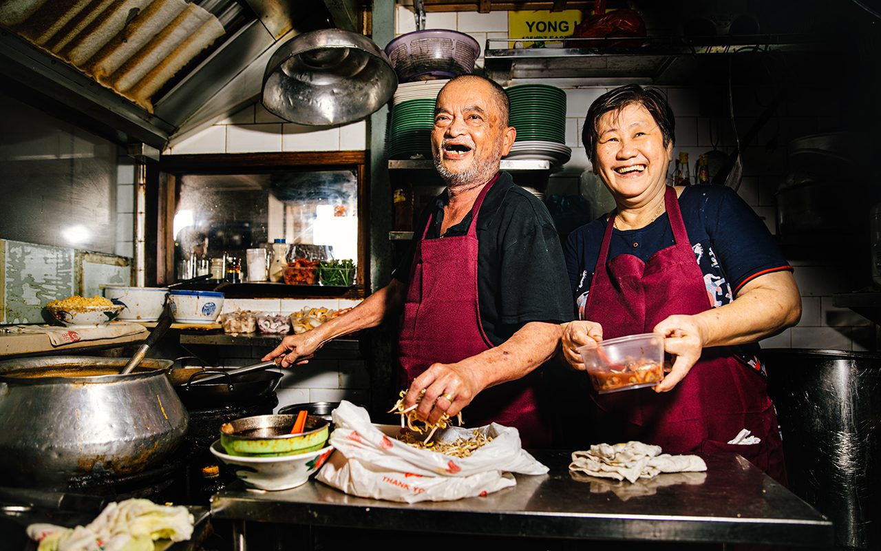 Uncle and Auntie Pang, the owners of Yong Huat food stall