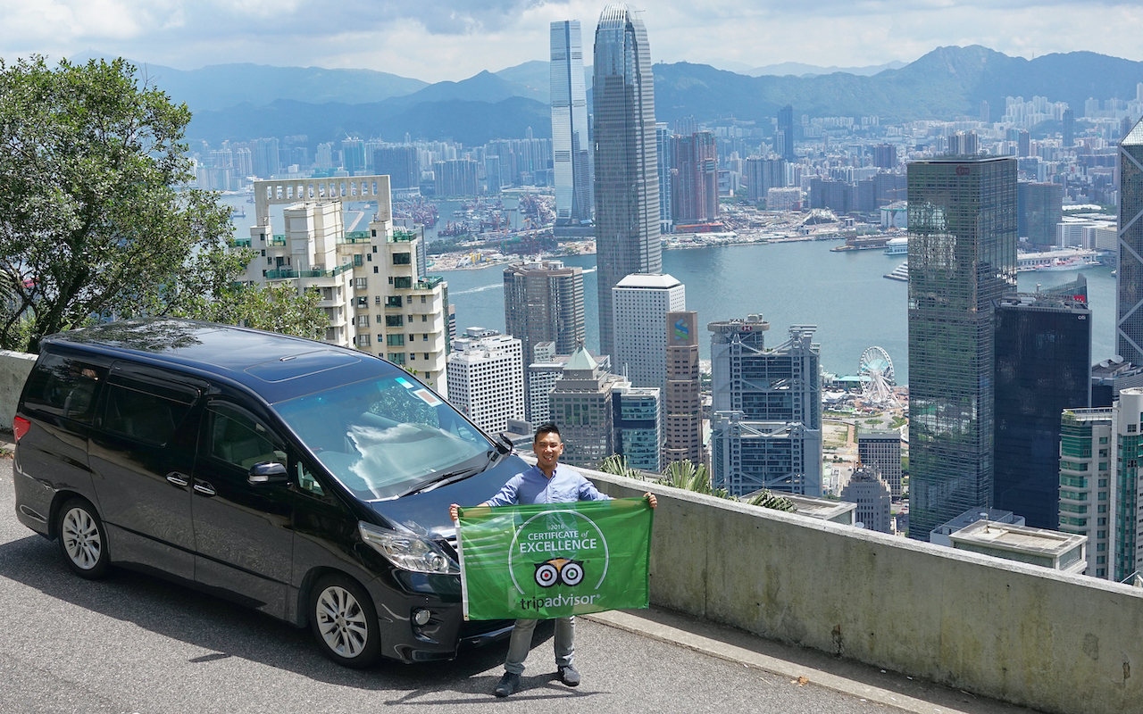 hong kong city car man with green flag