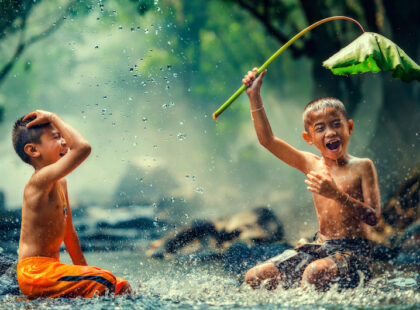 Children playing in the river in Cambodia