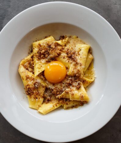 Bacone's fazzoletti with walnut butter and confit egg yolk
