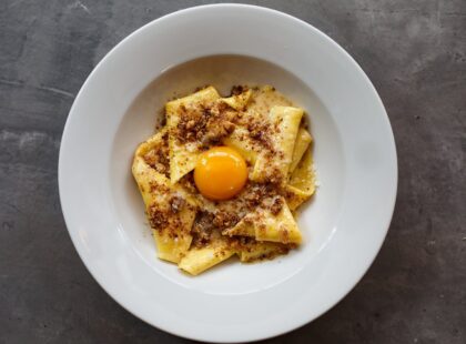 Bacone's fazzoletti with walnut butter and confit egg yolk
